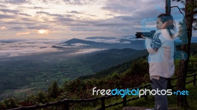 Woman Are Looking At The Beautiful Nature Stock Photo