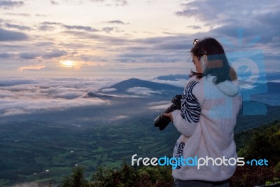 Woman Are Looking At The Camera After Take A Photo Stock Photo