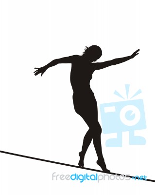 Woman Balancing On Rope Stock Photo
