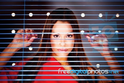 Woman Behind Blind Stock Photo