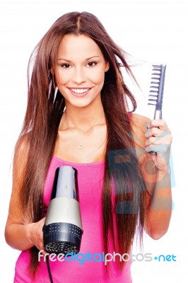 Woman Blow Dryer And Comb Stock Photo