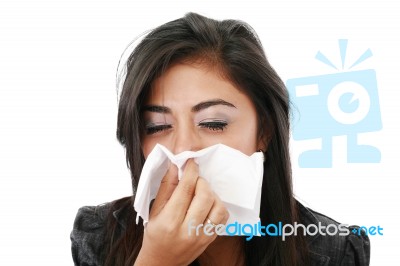 woman Blowing Her Nose Stock Photo