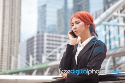 Woman Calling On The Phone Stock Photo
