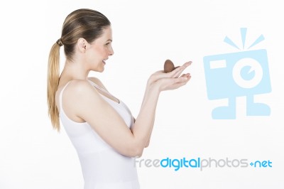 Woman  Chocolate Easter Egg Stock Photo
