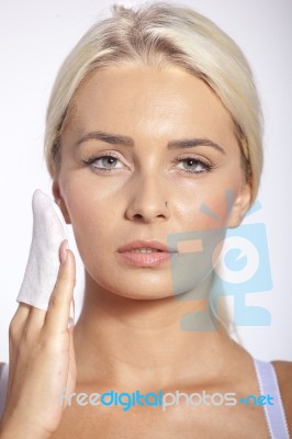 Woman Clean Face With Wet Wipes Stock Photo