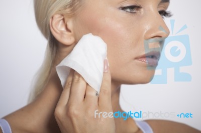 Woman Clean Face With Wet Wipes Stock Photo