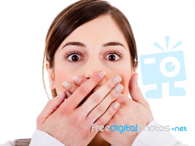 Woman Covering Her Mouth With Both Hands Stock Photo