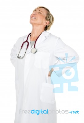 Woman Doctor With Back Pain Stock Photo