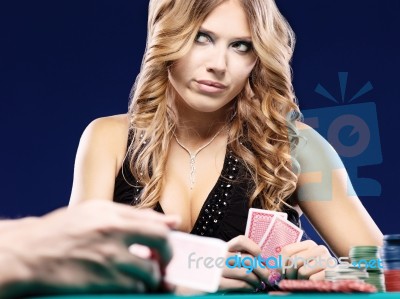 Woman Doubt In Gambling Match Stock Photo