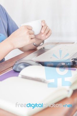 Woman Drinking Hot Coffee Stock Photo