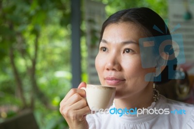 Woman Drinking Tea Stock Photo