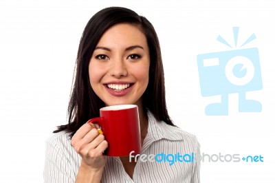 Woman Enjoying Coffee During Work Break Stock Photo