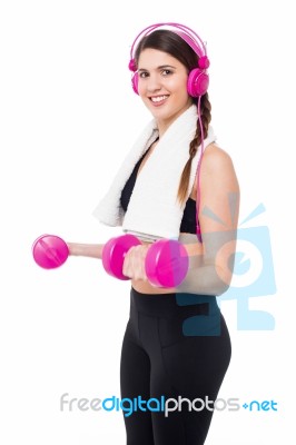 Woman Enjoying Workout With Music Stock Photo