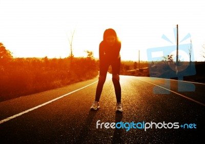 Woman Exercising Outdoor At Sunset Stock Photo Woman Exercising Outdoor At Sunset Stock Photo