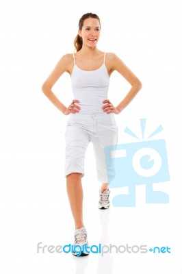 Woman Exercising Wearing White Stock Photo
