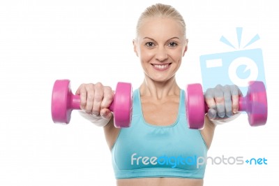 Woman Exercising With Dumbbells Stock Photo