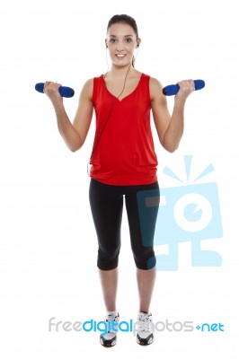 Woman Exercising With Weights Stock Photo