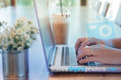 Woman Hands Typing On Laptop Stock Photo