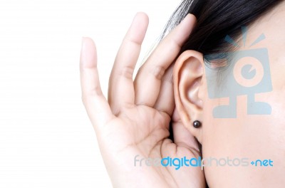 Woman Hearing Something Stock Photo