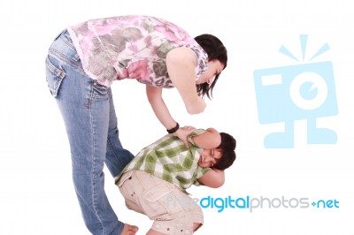 Woman Hitting Her Son Stock Photo