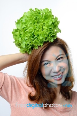 Woman Hold Hydroponics Green Oak Vegetable On Her Head Stock Photo
