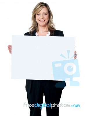 Woman Holding A Billboard Stock Photo