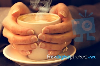 Woman Holding Coffee Latte Stock Photo