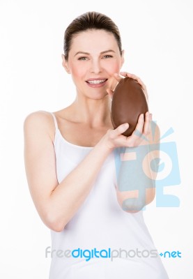 Woman Holding Easter Egg Stock Photo
