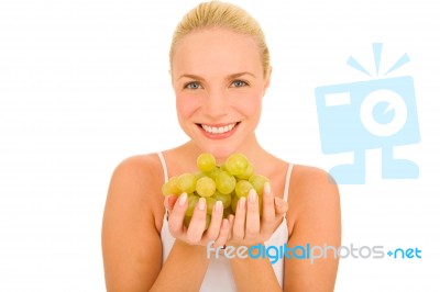 Woman Holding Grapes Stock Photo