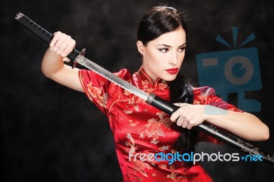 Woman Holding Katana Weapon Stock Photo