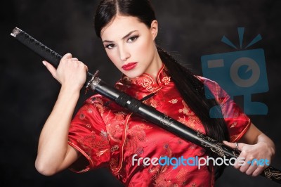 Woman Holding Katana Weapon Stock Photo