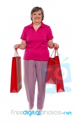 Woman Holding Shopping Bags Stock Photo