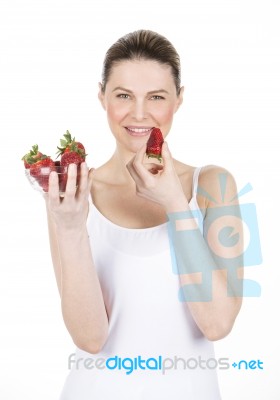 Woman Holding Strawberries Stock Photo