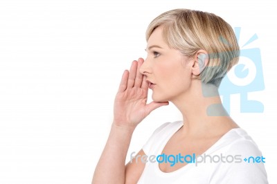 Woman In A Calling Gesture Stock Photo