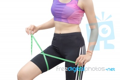 Woman In Sport Bra Measuring Her Body With Tape Isolated On Whit… Stock Photo