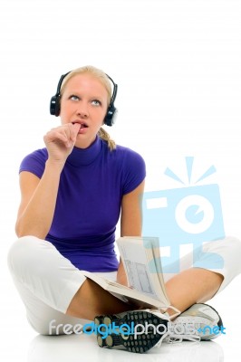 Woman Listening To Music Reading Stock Photo