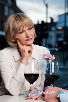 Woman Lost In Deep Thoughts Stock Photo