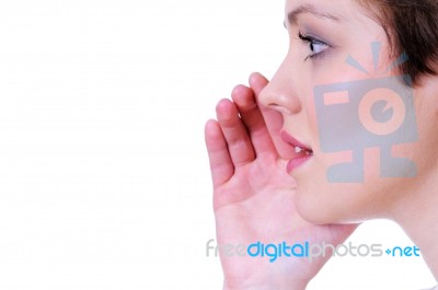 Woman Making Gossip Gesture Stock Photo