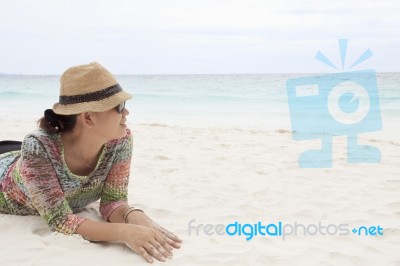 Woman On White Sand Beach Stock Photo