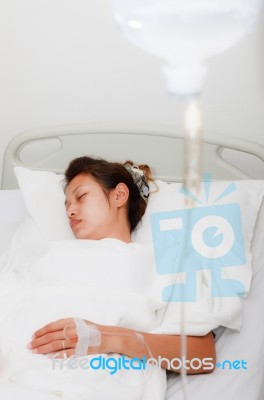 Woman Patient Sleepin In Hospital Bed Stock Photo