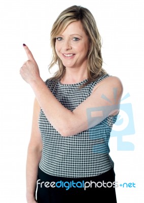 Woman Pointing Away Stock Photo