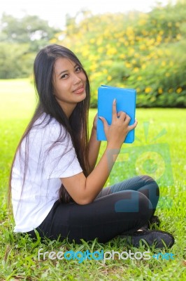 Woman Reading A Book Stock Photo