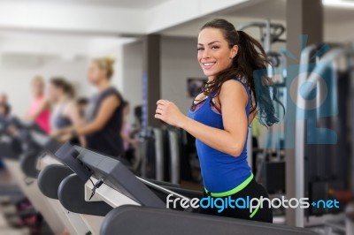 Woman Running On Treadmill Stock Photo