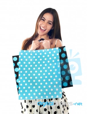 Woman Standing With Shopping Bag Stock Photo