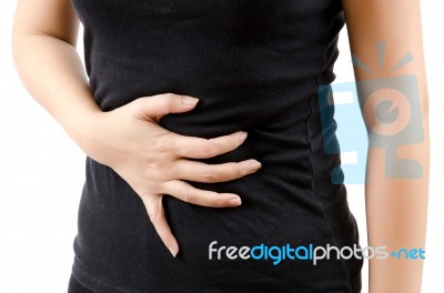 Woman Suffering From Abdominal Pain Stock Photo