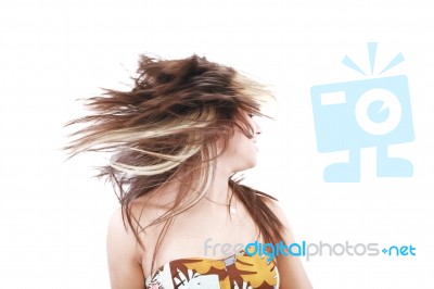 Woman Tossing Her Hair Stock Photo