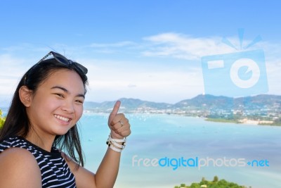 Woman Tourist Lifting Thumb Praise Beautiful Of Sea In Phuket, T… Stock Photo
