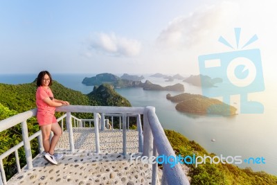 Woman Tourist On Peak Viewpoint Of Island Stock Photo