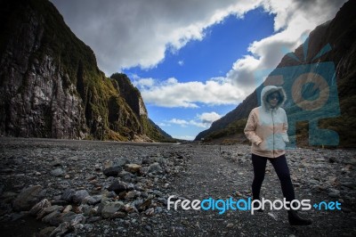 Woman Trekking In Franz Josef Glacier New Zealand Stock Photo