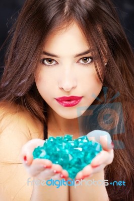 Woman With Blue Rocks Stock Photo
